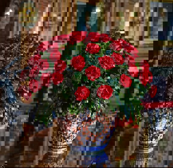 red roses on a table red roses on a table