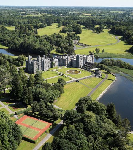 Exterior of Ashford Castle hotel located in Ireland Exterior of Ashford Castle hotel located in Ireland