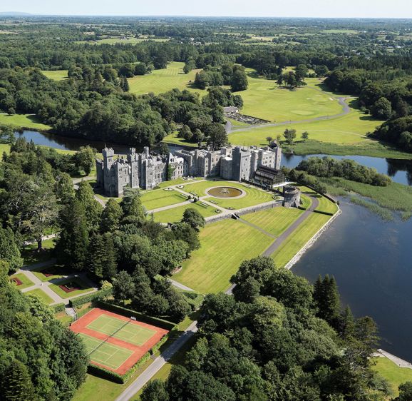 Exterior of Ashford Castle hotel located in Ireland Exterior of Ashford Castle hotel located in Ireland
