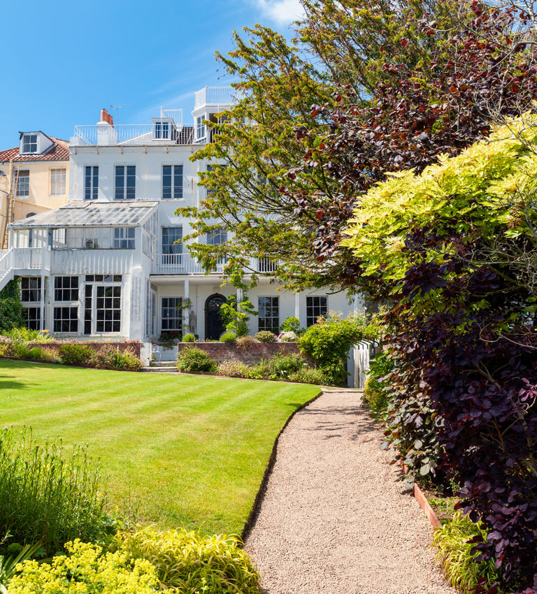 Hauteville House in Saint Peter Port, Guernsey, Channel Islands, UK on July 5, 2013. Famous french poet Victor Hugo used to live here in the 19th Century. Hauteville House in Saint Peter Port, Guernsey, Channel Islands, UK on July 5, 2013. Famous french poet Victor Hugo used to live here in the 19th Century.