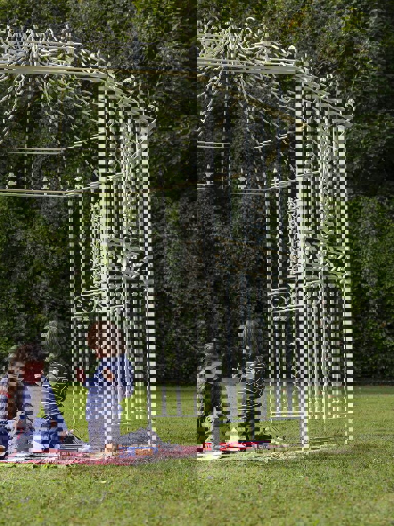 children playing in a gazebo outside children playing in a gazebo outside