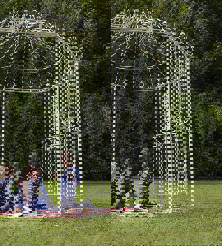 children playing in a gazebo outside children playing in a gazebo outside