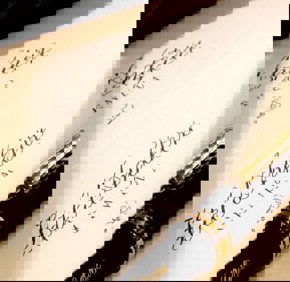 pen layed on a writing pad at d'Angleterre pen layed on a writing pad at d'Angleterre