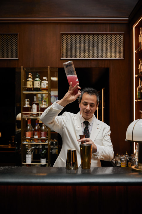 Angelo Lo Grecco mixing a cocktail at Stables Bar