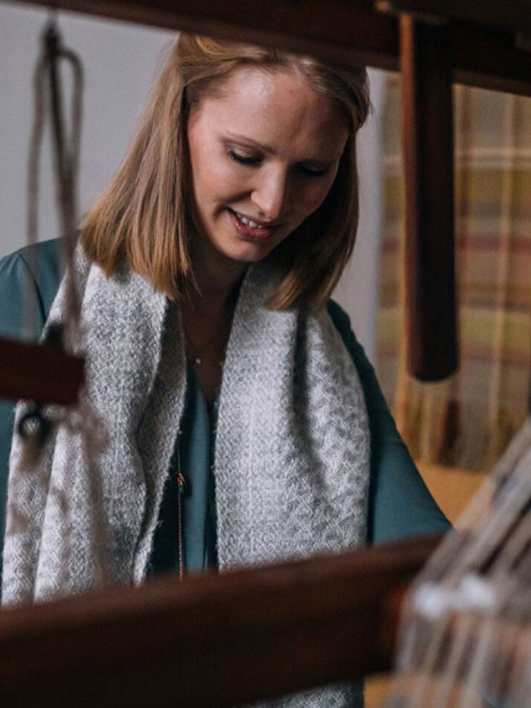 Woman weaving Woman weaving