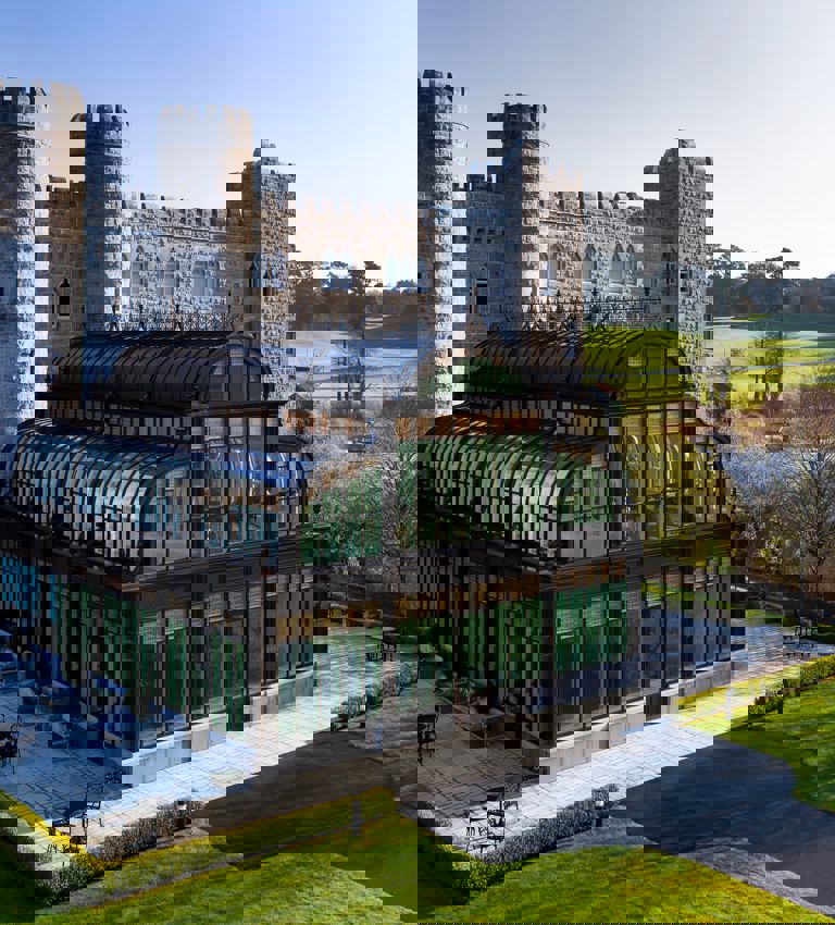 View of Ashford Caslte's Spa and Gym surounded by trees and grass View of Ashford Caslte's Spa and Gym surounded by trees and grass