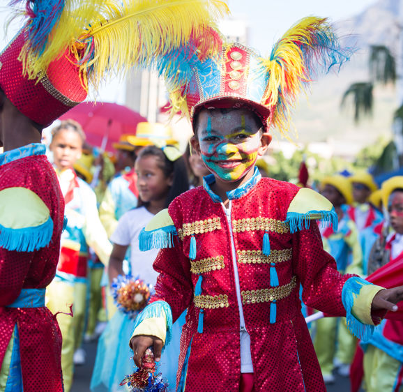 Minstrels children performing in there colorful costumes in celebration down the CBD streets of Cape Town  Minstrels children performing in there colorful costumes in celebration down the CBD streets of Cape Town