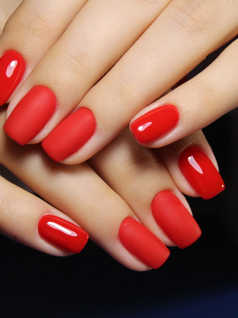 Manicure with long nails on a trendy texture background Manicure with long nails on a trendy texture background
