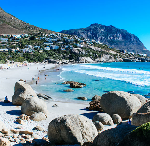 Scenic landscape of Llandudno Beach with white sand and turquoise water in Cape Town, South Africa Scenic landscape of Llandudno Beach with white sand and turquoise water in Cape Town, South Africa