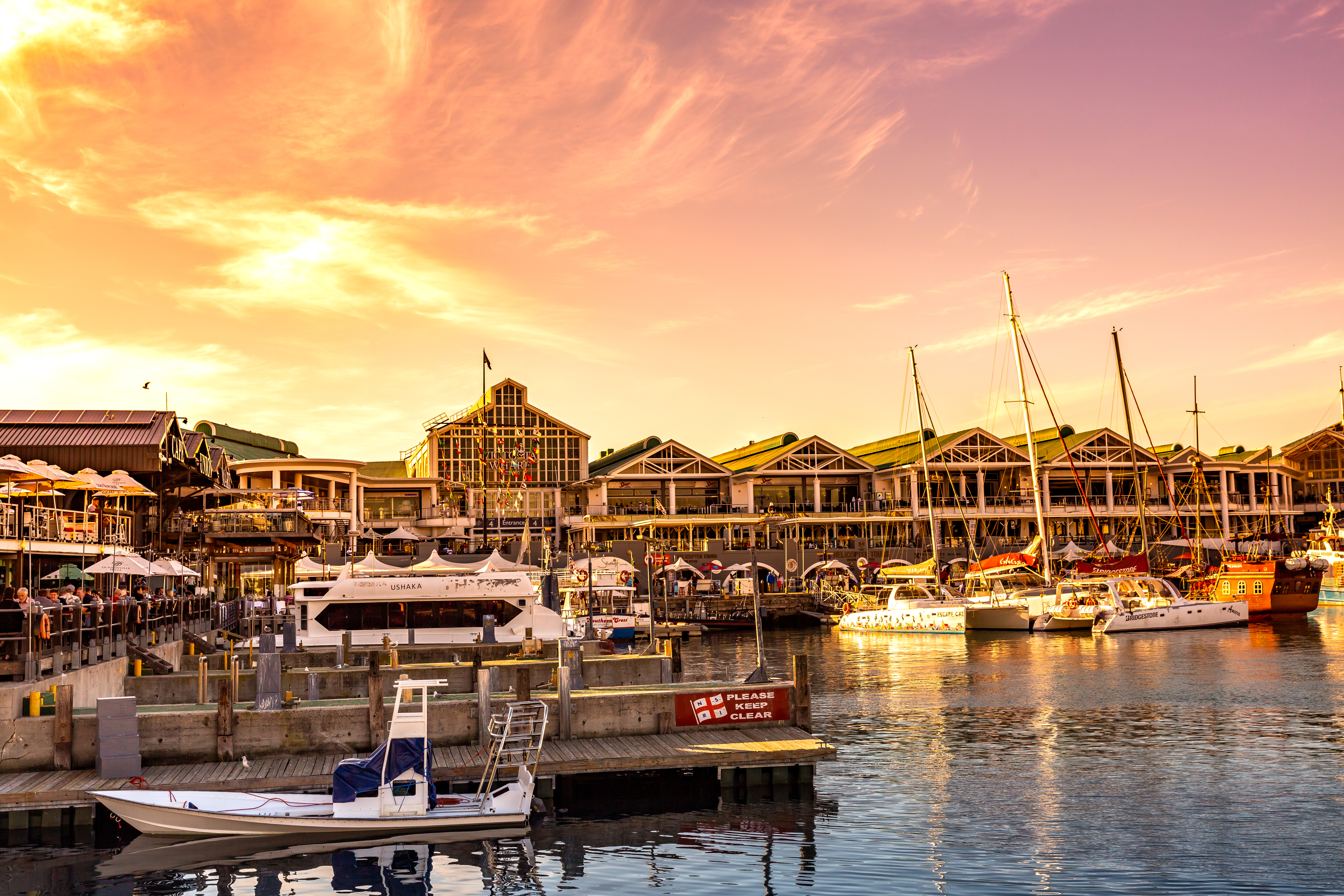 Cape Town harbor, Victoria and Alfred Waterfront at sunset and Table mountain, South Africa