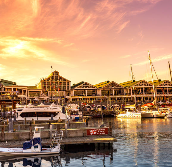 Cape Town harbor, Victoria and Alfred Waterfront at sunset and Table mountain, South Africa Cape Town harbor, Victoria and Alfred Waterfront at sunset and Table mountain, South Africa