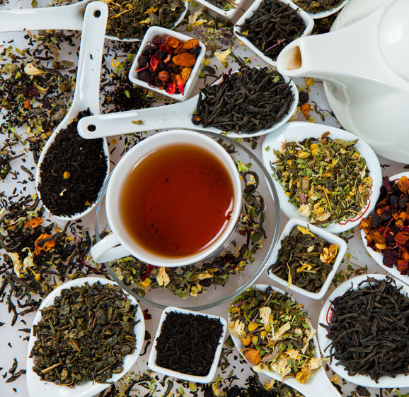 Assortment of dry tea. Various kinds of tea isolated on white.Different kinds of tea leaves. Tea composition with different kind of tea. Tea concept. Tea leaves Assortment of dry tea. Various kinds of tea isolated on white.Different kinds of tea leaves. Tea composition with different kind of tea. Tea concept. Tea leaves