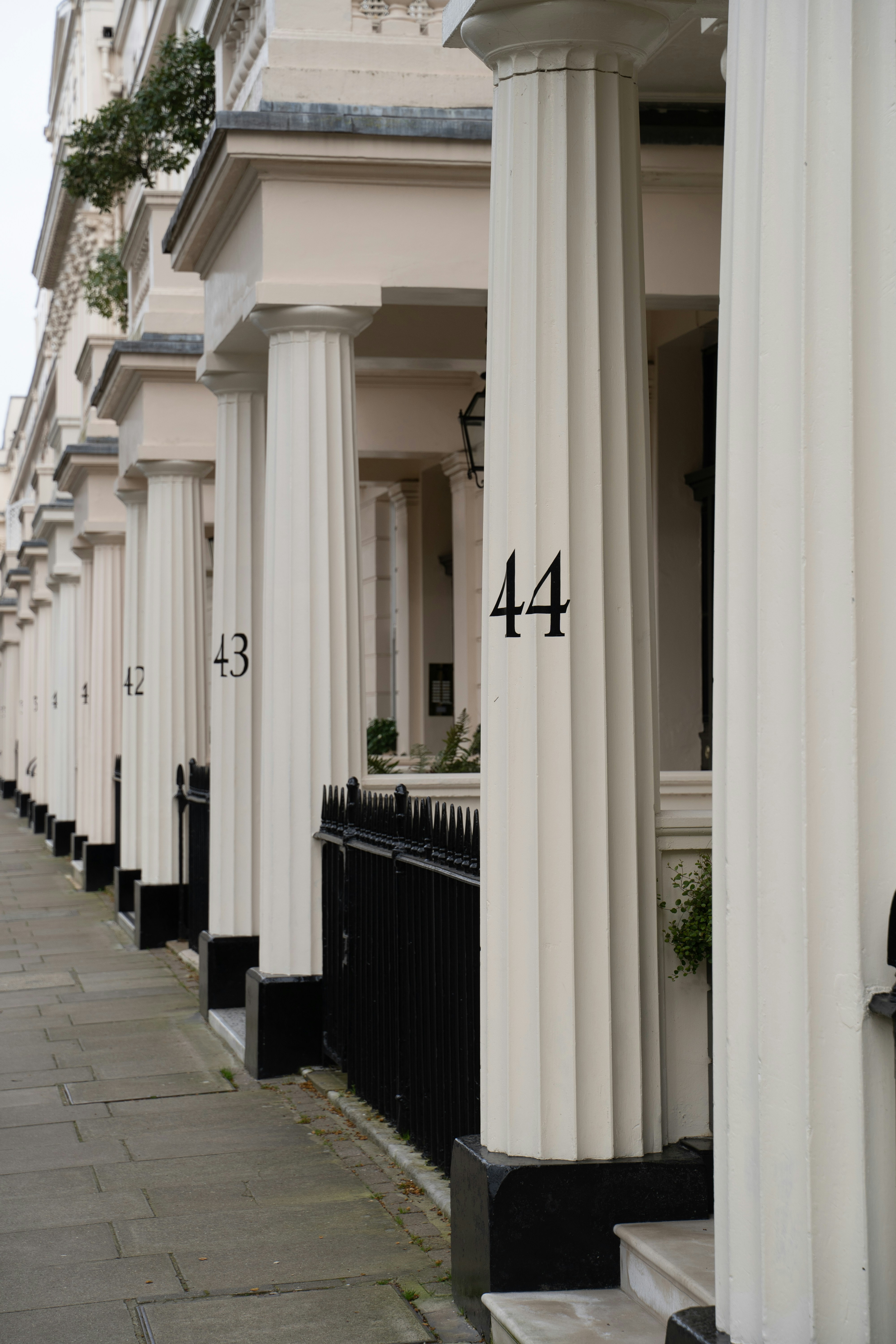Cream pillars outside Belgravia home 