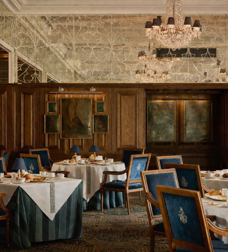 George V restaurant at Ashford castle set for breakfast with fresh pastries and linen table cloths. George V restaurant at Ashford castle set for breakfast with fresh pastries and linen table cloths.