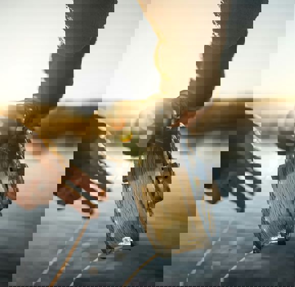 Fishing at sunrise reeling in the rod Fishing at sunrise reeling in the rod