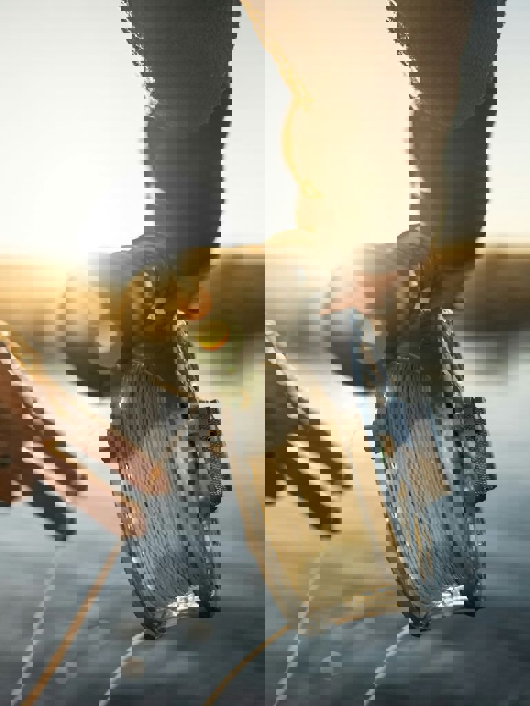 Fishing at sunrise reeling in the rod Fishing at sunrise reeling in the rod