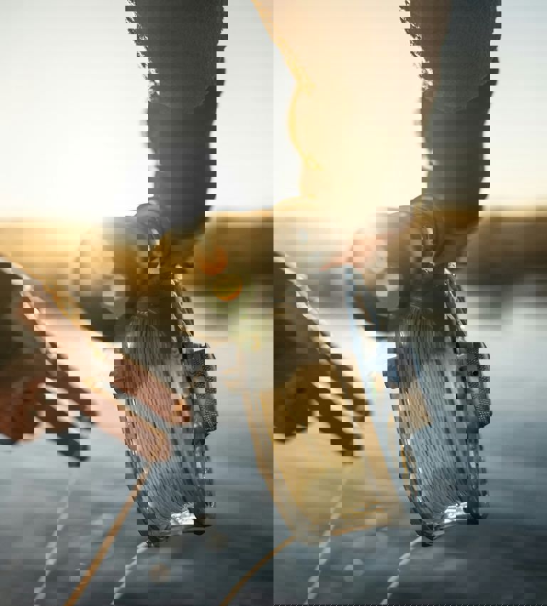 Fishing at sunrise reeling in the rod Fishing at sunrise reeling in the rod