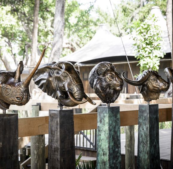 Iron heads od a rhino, elephant, lion, buffalo and cheetah design detail Iron heads od a rhino, elephant, lion, buffalo and cheetah design detail