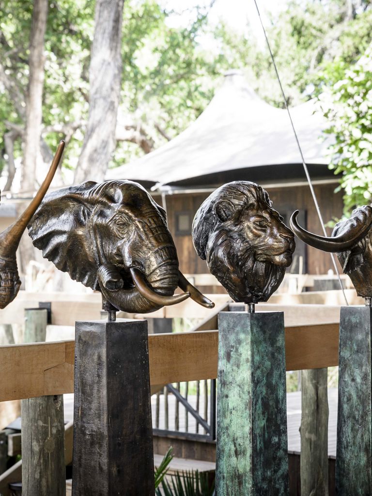 Iron heads od a rhino, elephant, lion, buffalo and cheetah design detail Iron heads od a rhino, elephant, lion, buffalo and cheetah design detail