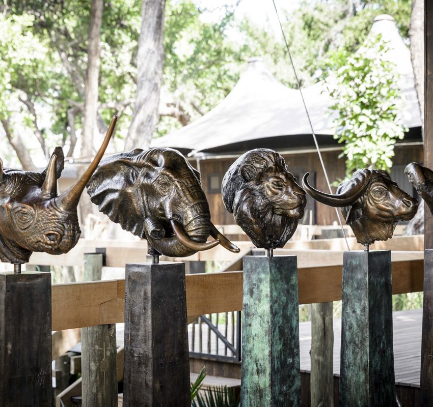 Iron heads od a rhino, elephant, lion, buffalo and cheetah design detail Iron heads od a rhino, elephant, lion, buffalo and cheetah design detail