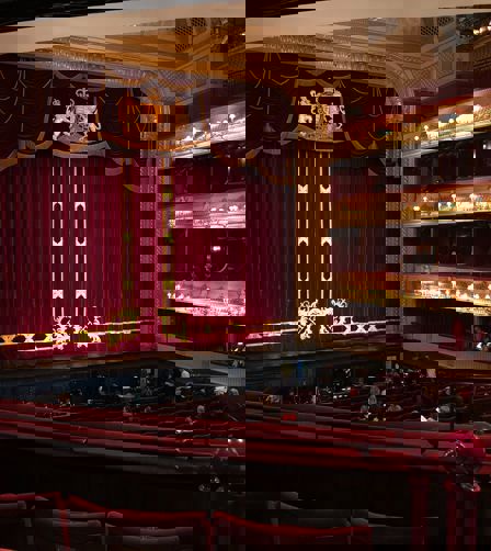 Seating inside a London theatre Seating inside a London theatre