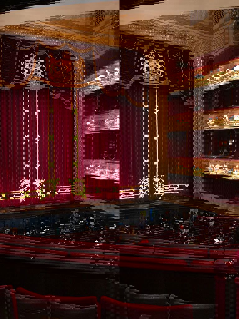 Seating inside a London theatre Seating inside a London theatre