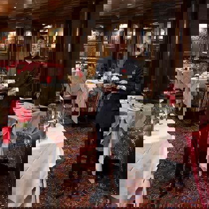 The Rubens Curry Room with waiter The Rubens Curry Room with waiter