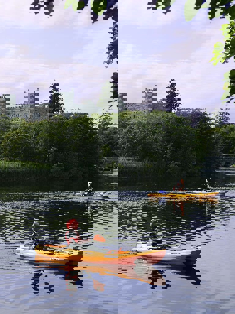 Guests kayaking on Ashford Castle grounds Guests kayaking on Ashford Castle grounds