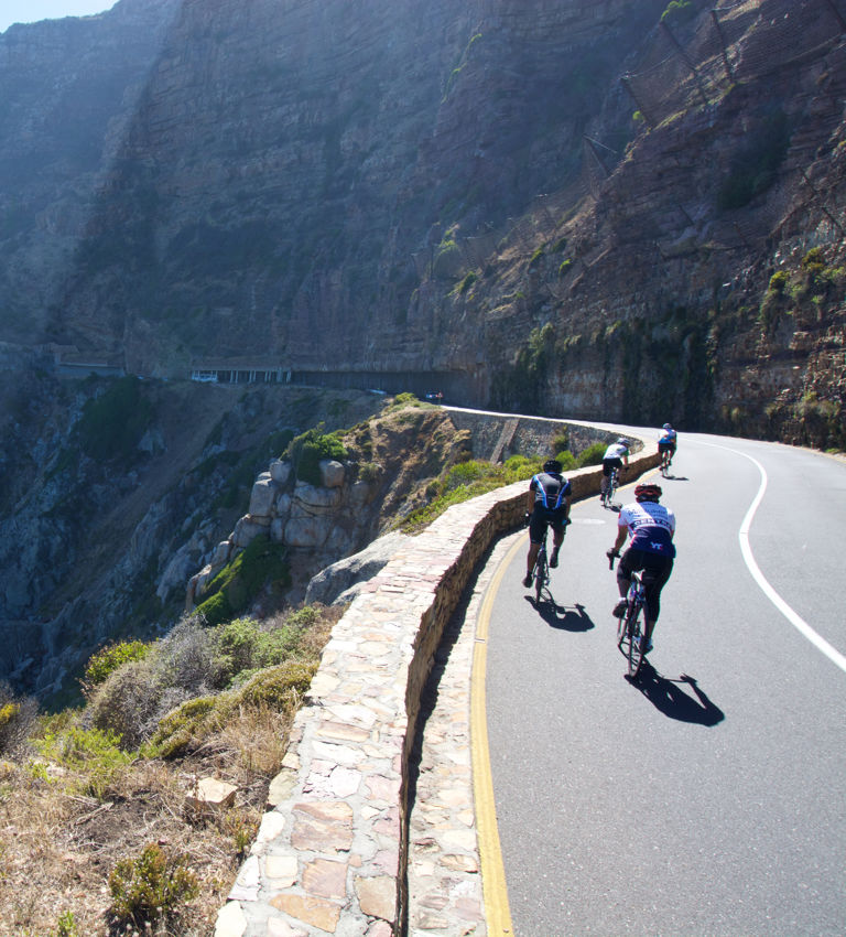 Cyclists practice for Argus Cycle Tour along Chapman's Peak Pass. Cyclists practice for Argus Cycle Tour along Chapman's Peak Pass.