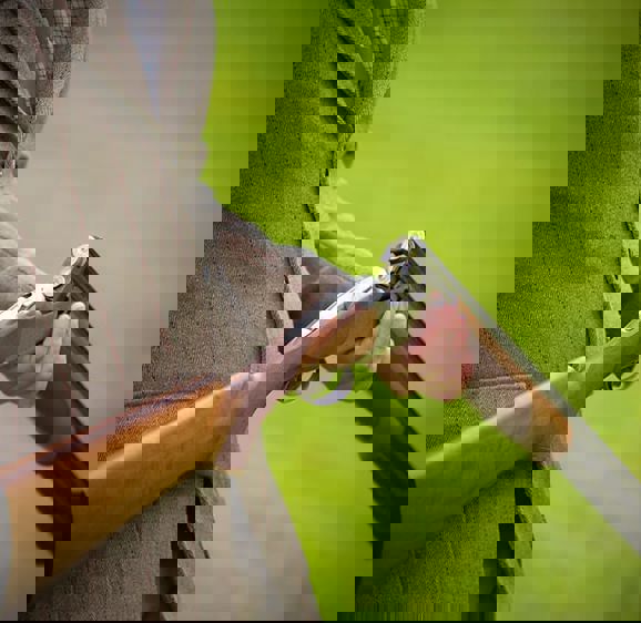 Man experiencing clay pigeon shooting Man experiencing clay pigeon shooting