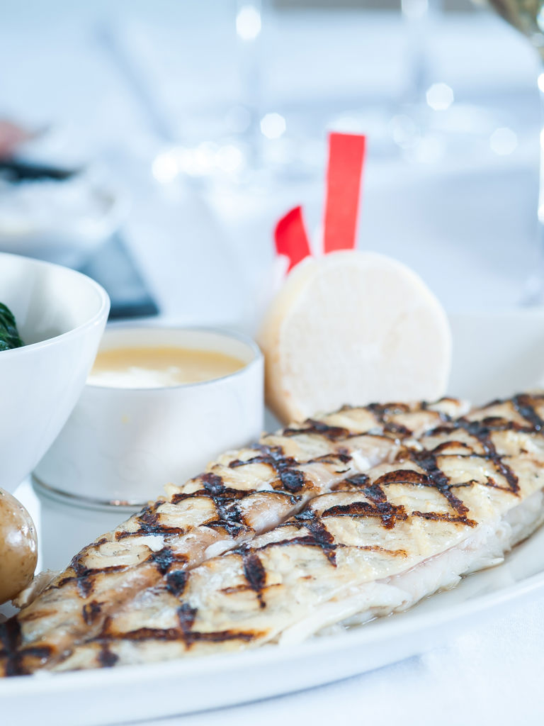 Dover Sole accompanied by potatoes Dover Sole accompanied by potatoes