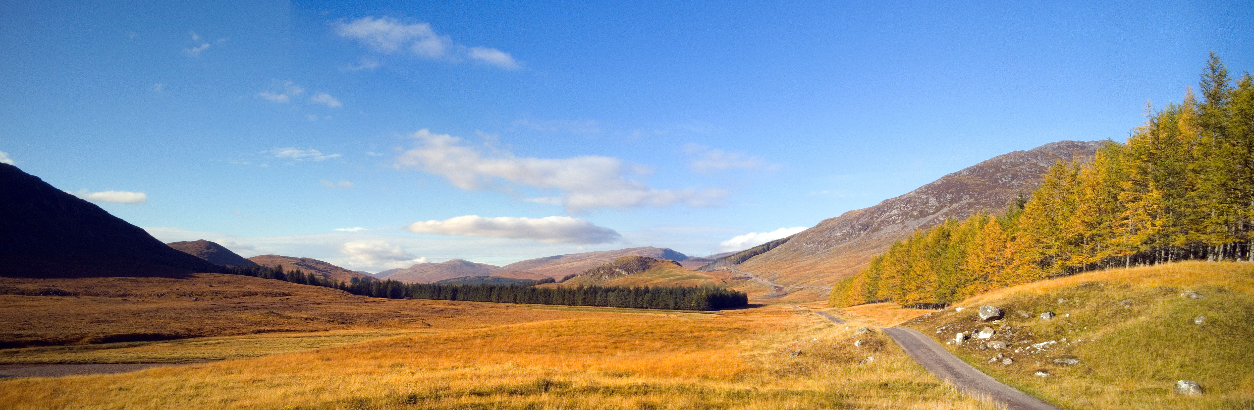 General Wades military road towards the Corrieyairack Pass with the river Spey to the left, near Laggan, Newtonmore and Aviemore in Scotland