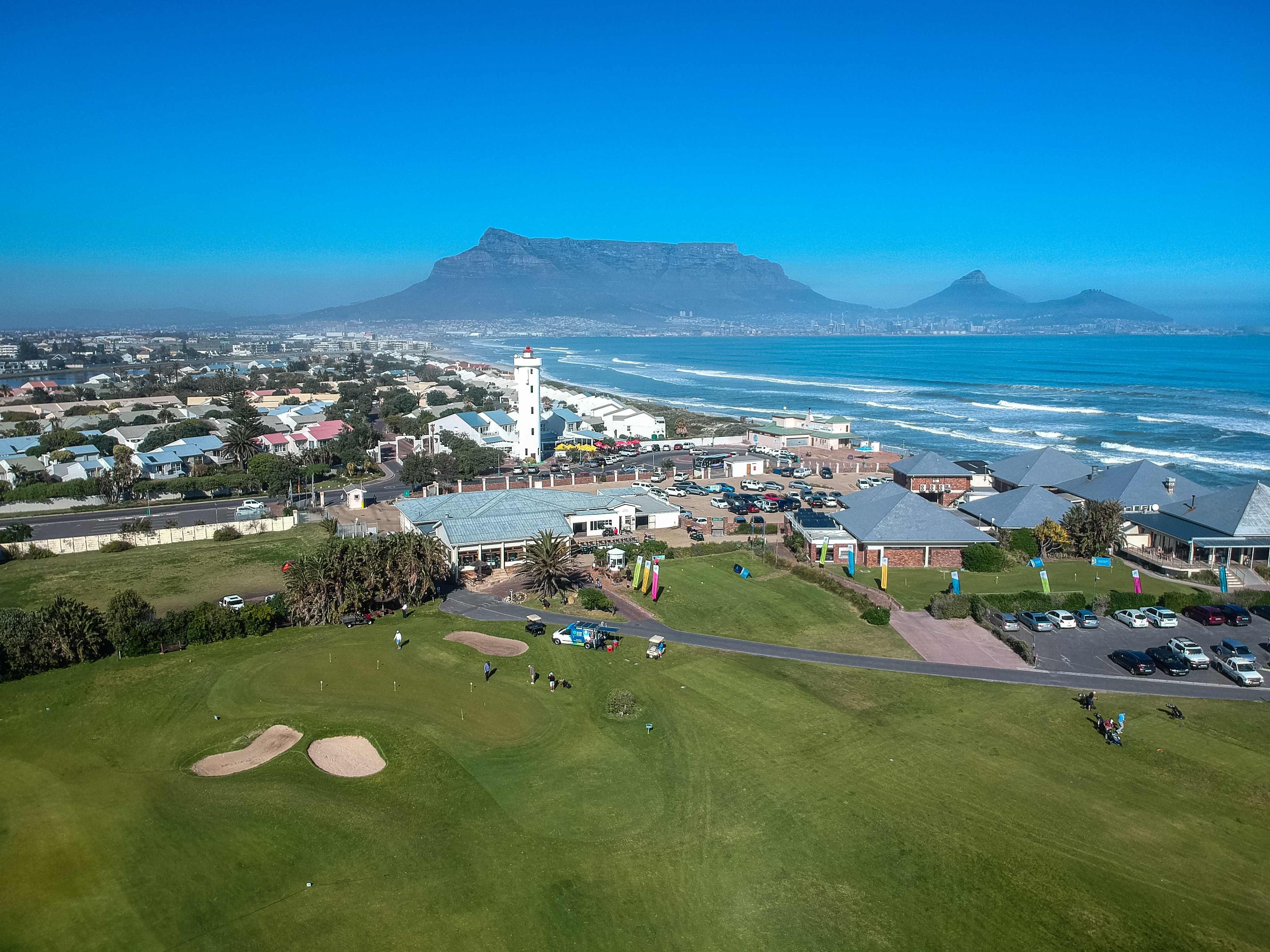 Milnerton Golf Course. On the edge of the Atlantic Ocean with Table Mountain across the bay.