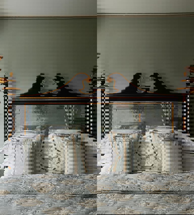 Bed and bedside details in Junior Suite Bed and bedside details in Junior Suite